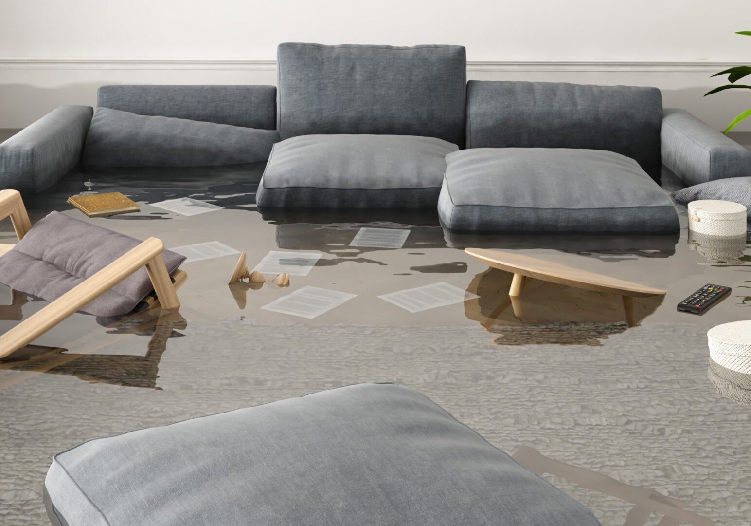 A living room flooded with water and debris.